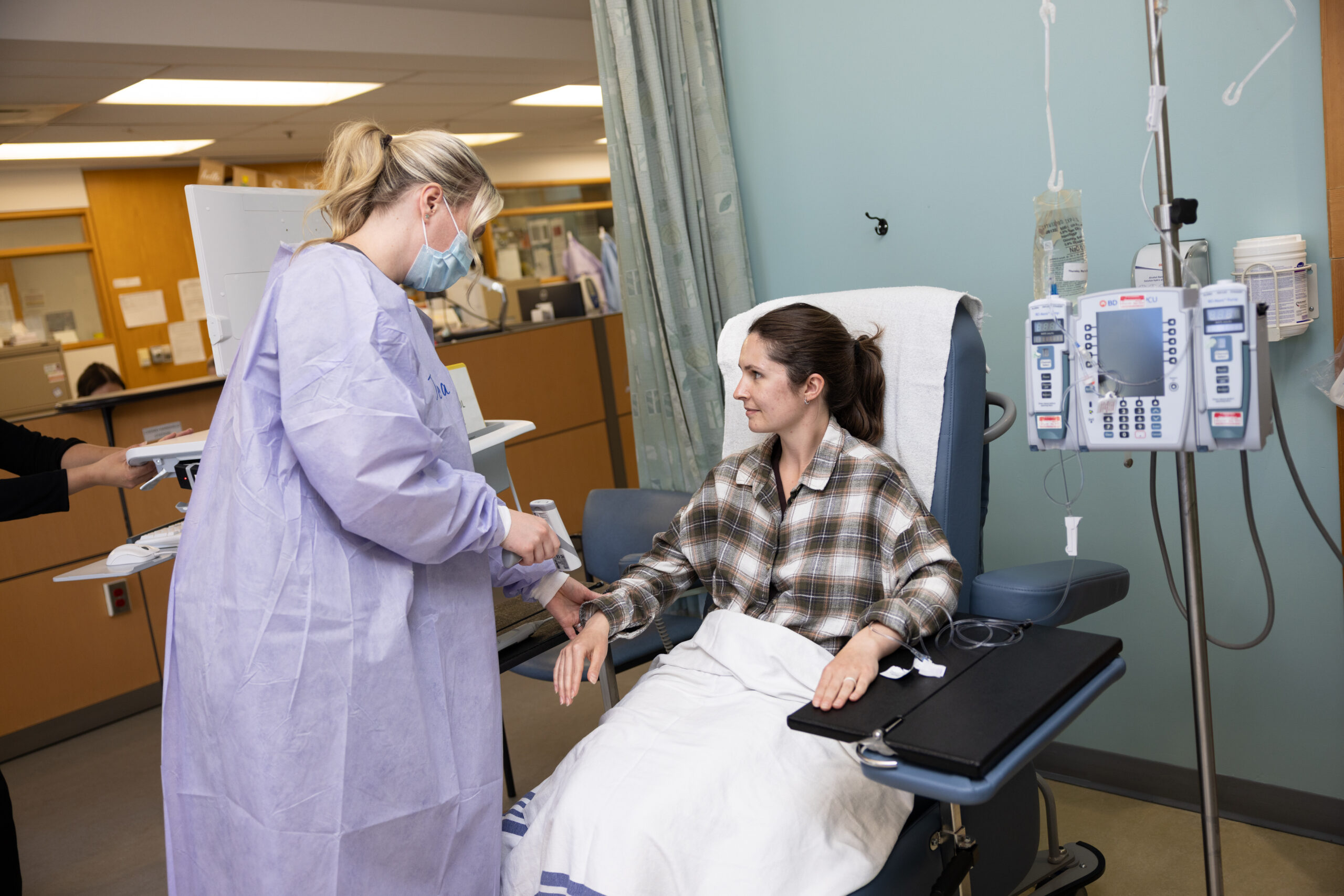 patient getting IV cancer treatment in the systemic therapy suite at WRHN Cancer Centre.